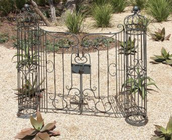 Metal garden gate with natural brown tones